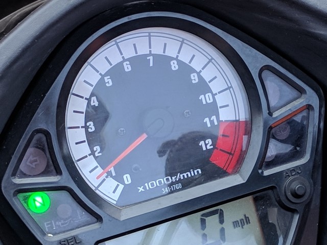 How to adjust motorcycle idle speed?
